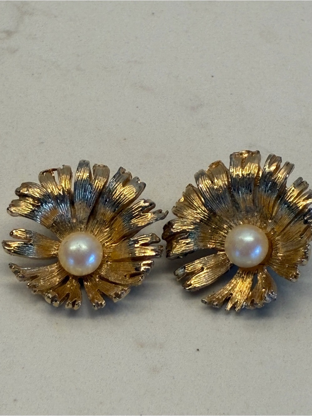 Vintage gold-tone flower earring signed by costume jewelry manufacturer M.JENT